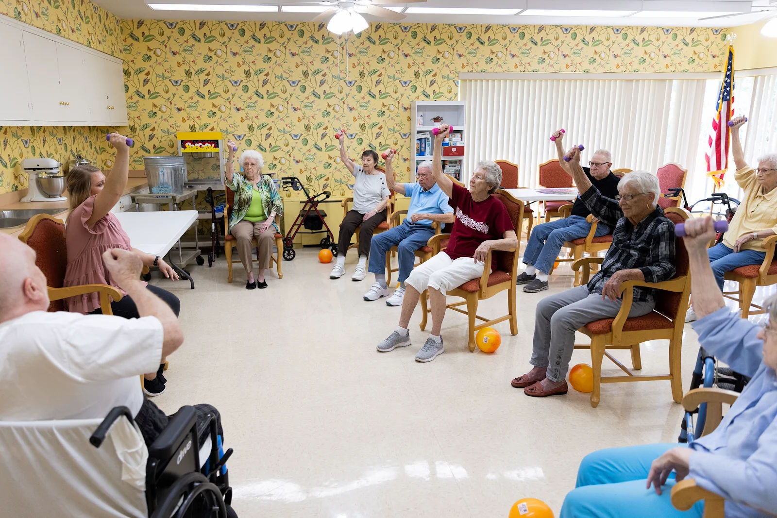 Wesley Manor Assisted Living Community offering assisted living and continuing care retirement community (CCRC) services in Louisville, KY, residents staying active as they take part in a fitness class