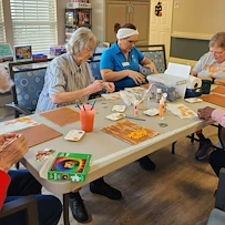 Charter Senior Living of Gallatin, Tennessee, residents being creative and doing arts and crafts