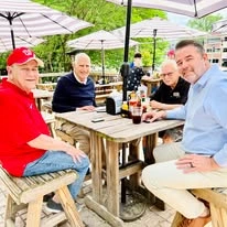 residents eating outside at Hessler Heights Gracious Retirement Living Hawthorn Senior Independent Living in Leesburg, Virginia