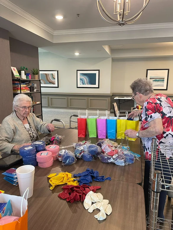 Calumet Trace - a Charter Senior Living Community residents giving back to the community by making gift bags