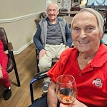 Aberdeen Crossings by New Perspective, senior living community offering assisted living in Highland Heights, OH, smiling residents enjoying each other's company