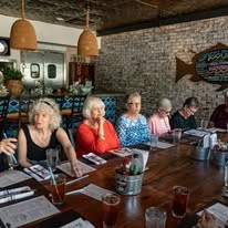 The Savoy Gracious Retirement Living Hawthorn Senior Independent Living in Winter Springs, Florida residents at a restaurant