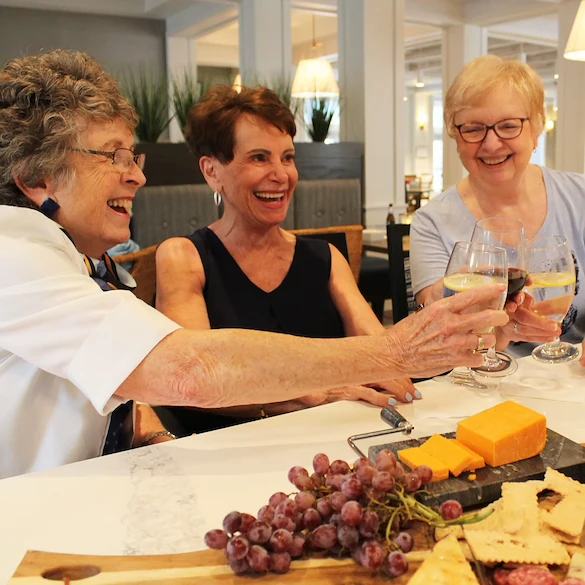 Residents cheersing at Novel Place at Blue Springs