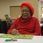 Avina of Milwaukee Senior Living assisted living and independent living in Milwaukee, WI, resident playing bingo