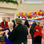 Salmon Creek Gracious Retirement Living Hawthorn Senior Independent Living in Boise, Idaho residents dancing at a party