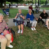 Ivy Creek Gracious Retirement Living Hawthorn Senior independent Living in Glen Mills, Pennsylvania residents sitting outside on the lawn