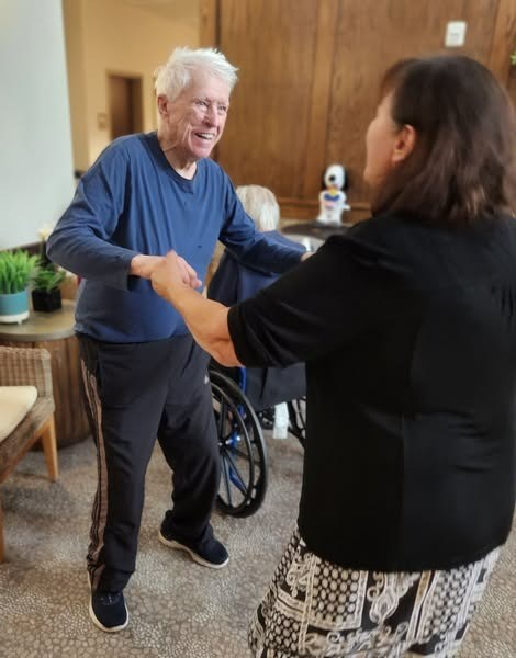 Fieldstone Memory Care of Silverdale resident dancing