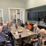 The Lodge at Pine Creek residents adding their own creative touch to hats to wear this spring and summer