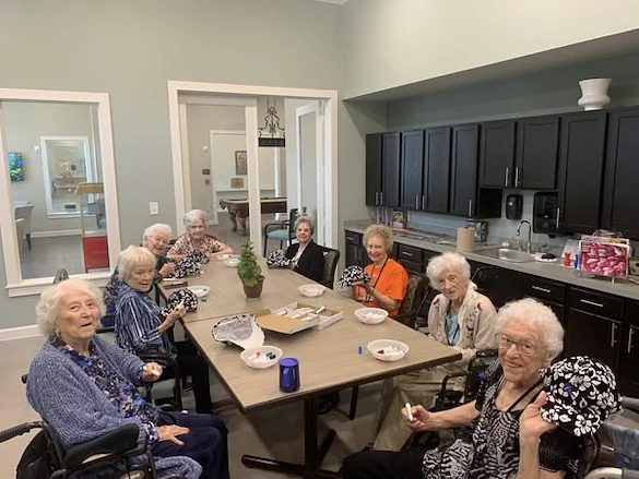 The Lodge at Pine Creek residents adding their own creative touch to hats to wear this spring and summer