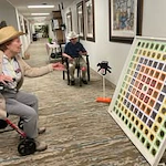 Summit Glen Gracious Retirement Living Hawthorn Senior independent Living in Colorado Springs, Colorado residents playing a game