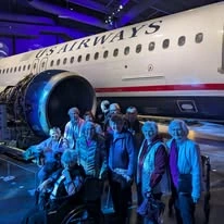 Williams Place Gracious Retirement Living Hawthorn Senior Independent Living in Davidson, North Carolina residents touring an airplane