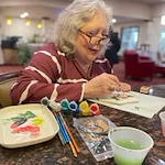 Julian Estates Gracious Retirement Living Hawthorn Senior Independent Living in Puyallup, Washington resident painting