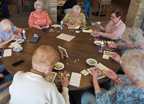 Residents of the Waters of Pewaukee created button easter eggs and played bingo