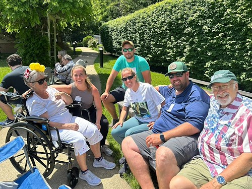 Charter Senior Living of Columbia residents and their families enjoying an event