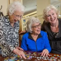 Camden Springs Gracious Retirement Living Hawthorn Senior Independent Living in Elk Grove, California residents solving a puzzle