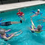 Cypress Springs Gracious Retirement Living Hawthorn Senior Independent Living in Lakewood Ranch, Florida residents lounging in the pool