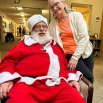 Ascension Living Via Christi Village Manhattan Senior Living in Manhattan, Kansas resident with Santa Claus