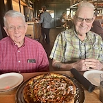 Wesley Manor Assisted Living Community offering assisted living and continuing care retirement community (CCRC) services in Louisville, KY, residents dining out at a restaurant