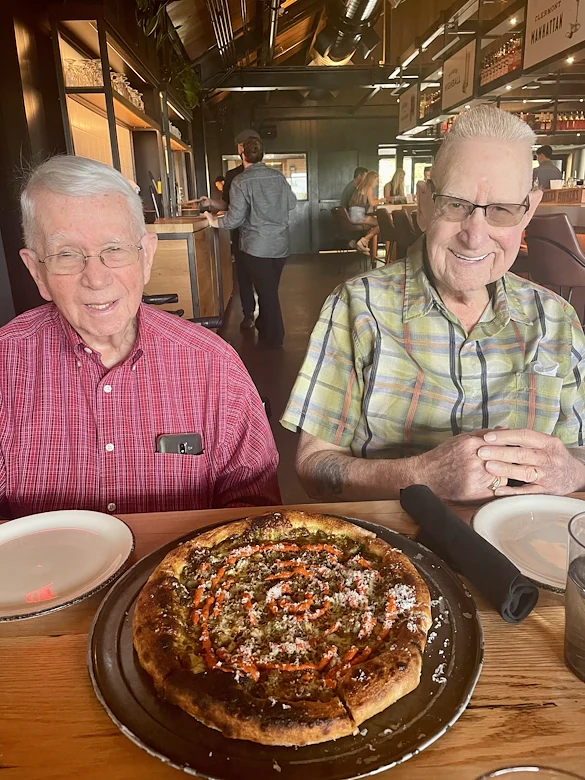 Wesley Manor Assisted Living Community offering assisted living and continuing care retirement community (CCRC) services in Louisville, KY, residents dining out at a restaurant