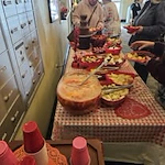 Avamere at Moses Lake senior living community offering independent living, assisted living, and respite care in Moses Lake, WA, residents serving themselves food from a buffet-style setup during a community gathering