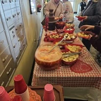 Avamere at Moses Lake senior living community offering independent living, assisted living, and respite care in Moses Lake, WA, residents serving themselves food from a buffet-style setup during a community gathering