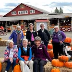Stoneybrook Lodge Gracious Retirement Living Hawthorn Senior Independent Living in Corvallis, Oregon residents visiting the pumpkin patch