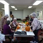 Carolina Estates Gracious Retirement Living Hawthorn Senior Independent Living in Greensboro, North Carolina residents doing arts and crafts
