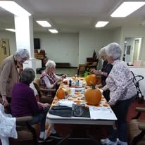 Carolina Estates Gracious Retirement Living Hawthorn Senior Independent Living in Greensboro, North Carolina residents doing arts and crafts
