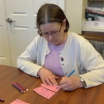 Residents Make Valentine Coffee Sleeves for Biggby Coffee Customers