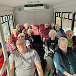 Salmon Creek Gracious Retirement Living Hawthorn Senior Independent Living in Boise, Idaho residents on the transportation bus