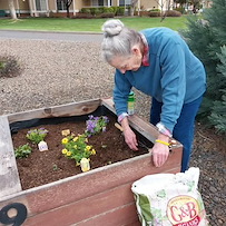 Fieldstone Memory Care of Yakima resident gardening