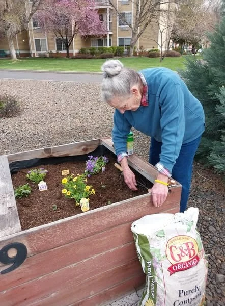 Fieldstone Memory Care of Yakima resident gardening