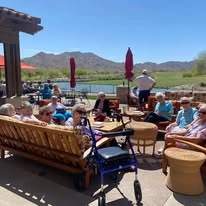 Estrella Estates Gracious Retirement Living Hawthorn Senior Independent Living in Goodyear, Arizona residents lounging outside