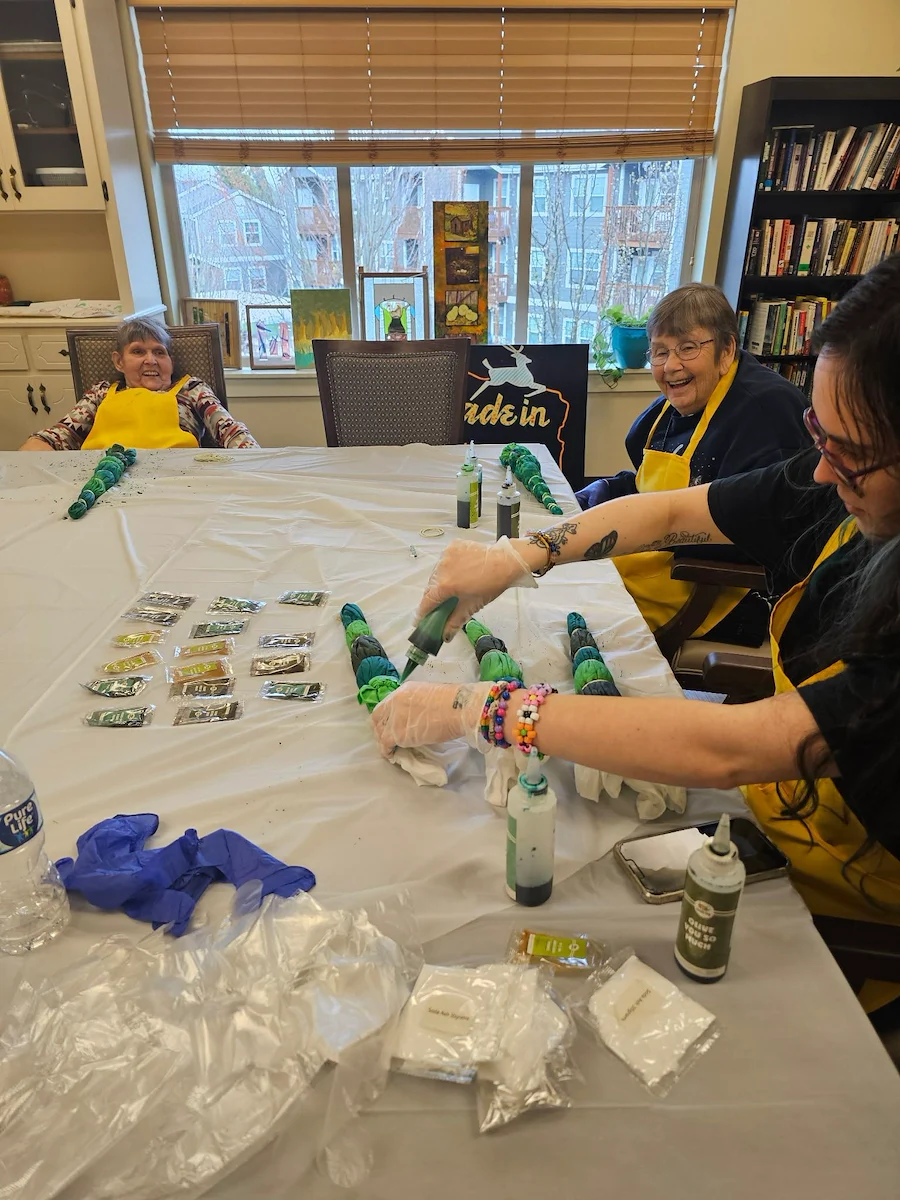 The Village at Keizer Ridge Assisted Living and Memory Care residents have fun doing crafts