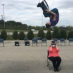 The Circus Comes to Harvester Place! Man does a flip over a resident