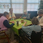 Allisonville Meadows Assisted Living offering assisted living, memory care, and respite care in Fishers, IN, residents enjoying doing arts and crafts together