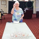 Springwood Landing Gracious Retirement Living Hawthorn Senior independent Living in Vancouver, Washington resident playing ping pong cup game