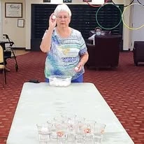 Springwood Landing Gracious Retirement Living Hawthorn Senior independent Living in Vancouver, Washington resident playing ping pong cup game