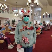 Summerville Estates Gracious Retirement Living Hawthorn Senior Independent Living in Summerville, South Carolina resident dressed up for Christmas party