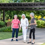 Rosewood Senior Living in Bakersfield, CA, residents on a walk together while enjoying the outdoors