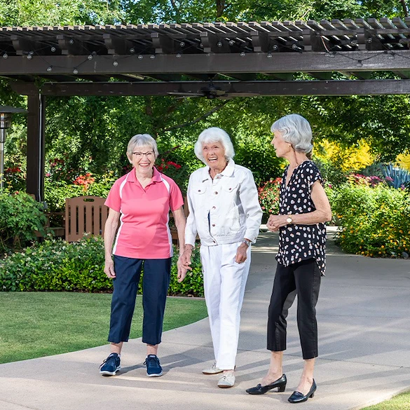 Rosewood Senior Living in Bakersfield, CA, residents on a walk together while enjoying the outdoors