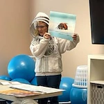 Stoneybrook Lodge Gracious Retirement Living Hawthorn Senior Independent Living in Corvallis, Oregon resident showing artistic painting