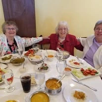 Kennedy Meadows Gracious Retirement Living Hawthorn Senior Independent Living in North Billerica, Massachusetts residents having dinner together