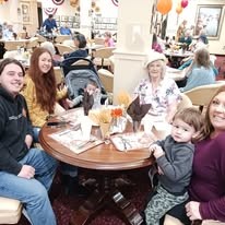 El Dorado Estates Gracious Retirement Living Hawthorn Senior Independent Living in El Dorado Hills, California resident eating dinner with family