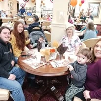 El Dorado Estates Gracious Retirement Living Hawthorn Senior Independent Living in El Dorado Hills, California resident eating dinner with family