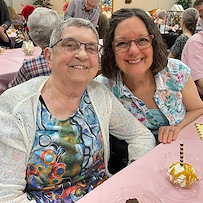 Schowalter Villa resident smiling during Mother's Day celebration