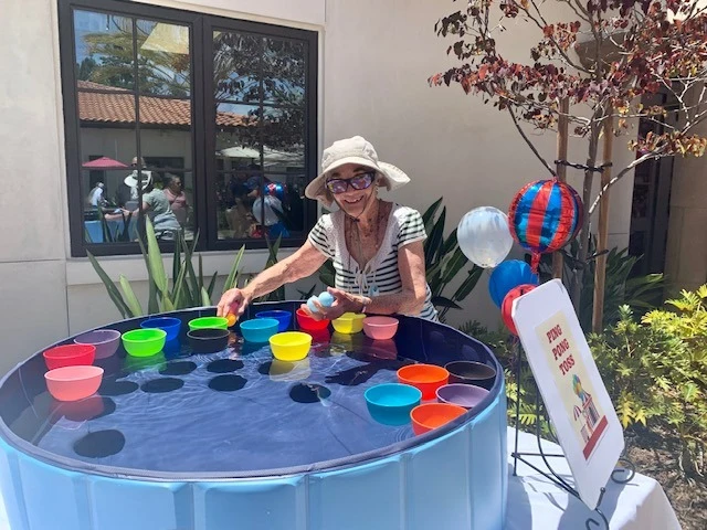 Covenant Living at Mount Miguel in Spring Valley, CA, resident participating in a fun outdoor activity