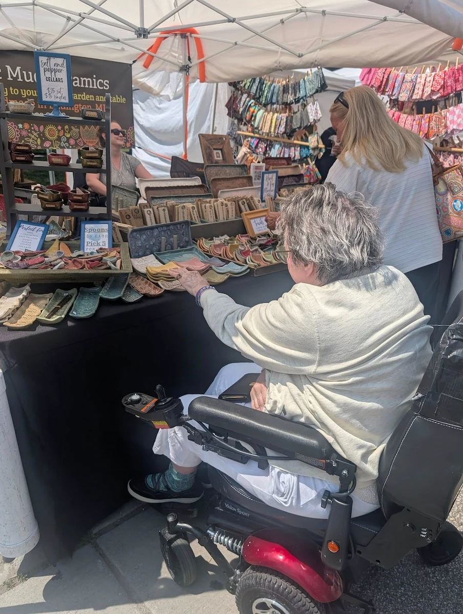 Charter Senior Living of Bay City resident enjoys an outing to a market