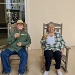 Wilshire Senior Living, independent living, assisted living, and memory care in Burleson, TX, residents enjoying a cocktail