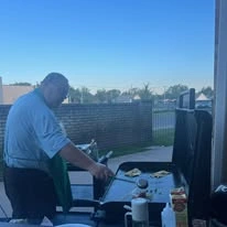 Ascension Living Via Christi Village McLean Senior Living in Wichita, Kansas resident grilling